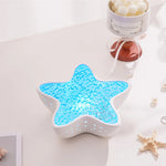 Tuzwa Ocean Wave Projector Night Light – 7 Color Rotating Starfish Lamp, 1200mAh Battery for Bedroom & Ambient Lighting