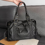 Retro Handbag with Adjustable Strap | Spacious Black Leather Bag for Everyday Elegance 0
