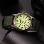 Tuzwa Men's Luminous Military Watch – Quartz Movement, Easy-Read Arabic Numerals, Nylon Strap, Slim 8mm Round Case