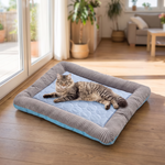 Ice silk cooling pad with a cat lounging on it by a patio door