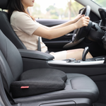 Memory foam car seat cushion with height increase in use on a driver seat