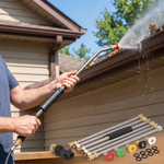 Gutter cleaning pressure washer extension wand spraying a roof gutter