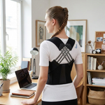 Posture corrector brace worn by a woman