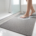 Non-slip shower mat in a shower stall