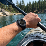 Rugged waterproof watch worn by a kayaker
