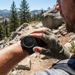 Digital military sports watch worn on a hike