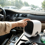 Portable mini air conditioner in use in a car
