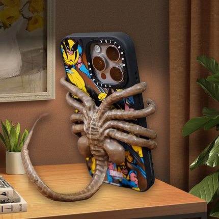 Facehugger Phone Holder for Desk with Adjustable Tail, Phone Stand for Cell Phones