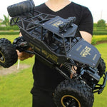 Tuzwa RC Rock Crawler Truck – All-Terrain Remote Control Car, 50m Range, 15 km/h, Shock-Absorbing Suspension & 30-Min Runtime